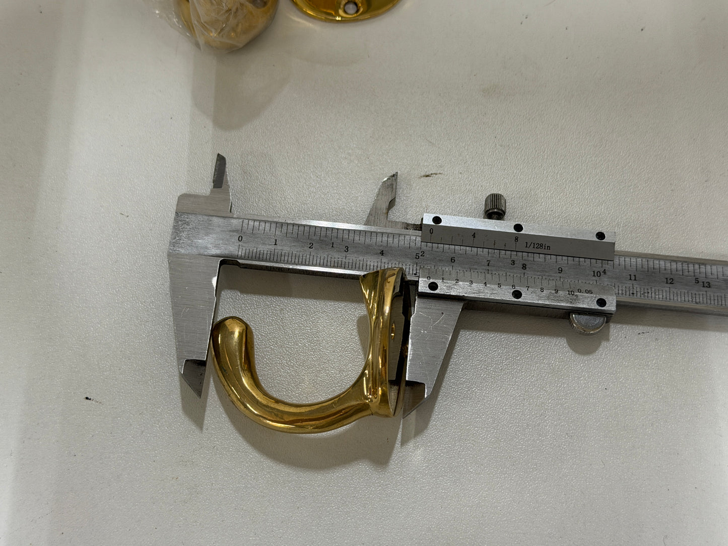 Bronzen/messing haakje 40 mm | gebruikt