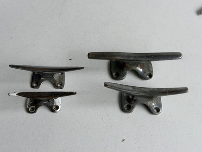 4 bronzen/messing kikkers 125/100/95/79 mm